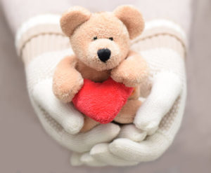 teddy bear in hands